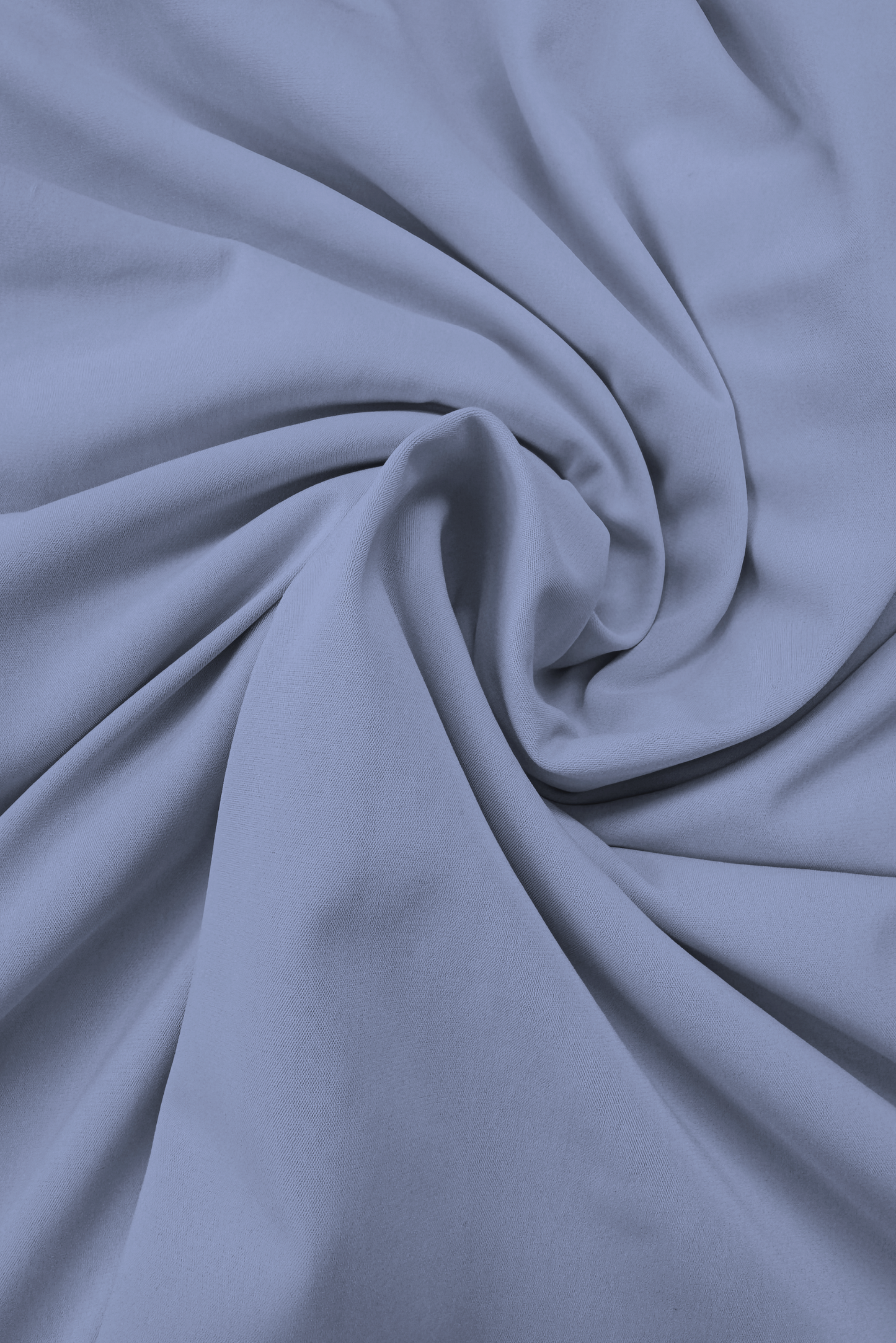 Close-up of blue fabric with folds
