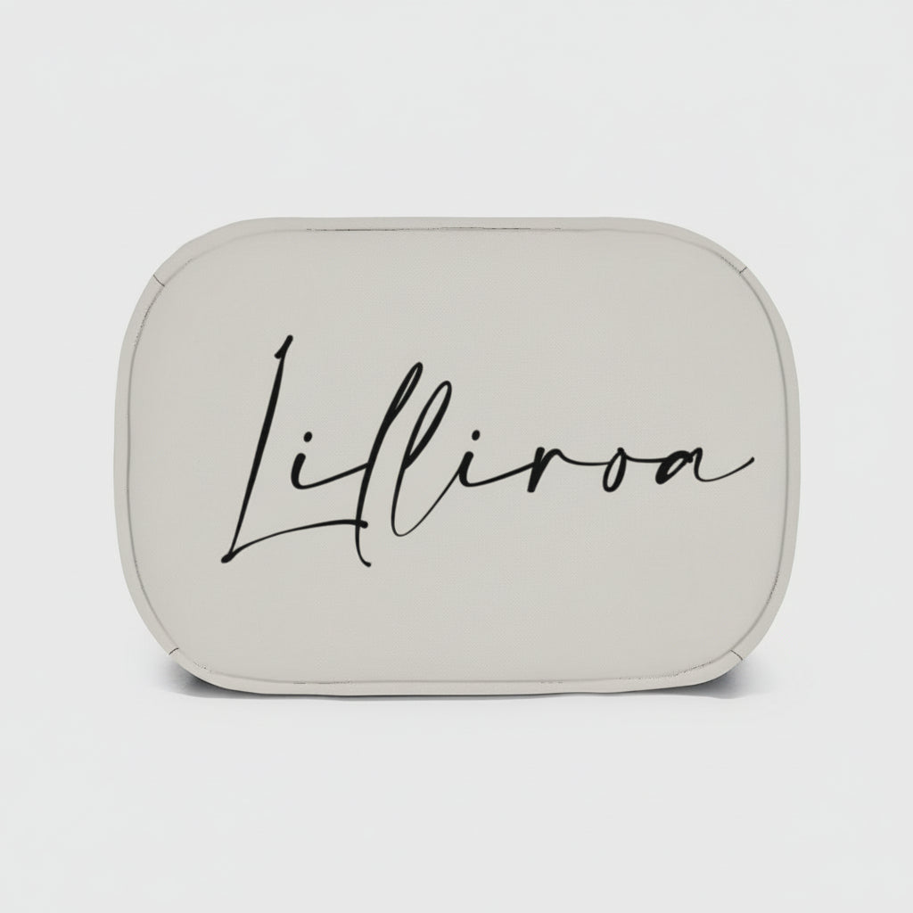 A sleek bottom of a small insulated lunch bag with rounded edges and black cursive lilliroa logo