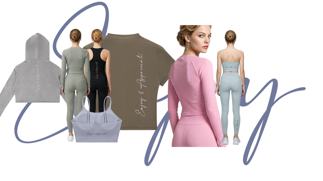 Gray hooded sweatshirt with enjoy and appreciate embroidered in white script on the back for mindful activewear