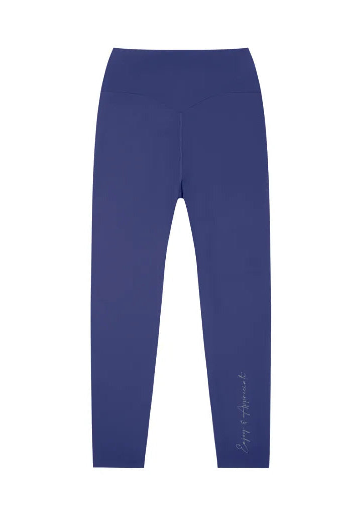 Seamless navy blue high-waisted activewear leggings with a subtle cursive script design on the outer side