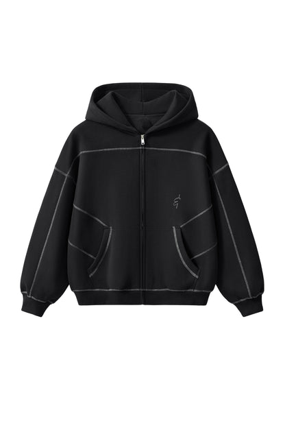 A black zip-up hoodie with contrasting light gray stitched panel lines and a small white embroidered logo on the left chest, displayed against a solid white background.