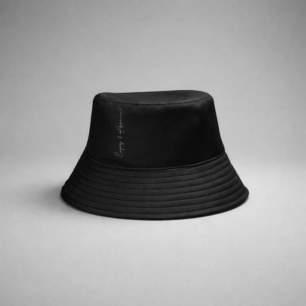 Black bucket hat with subtle quilted texture and delicate embroidered script on the side for casual wear