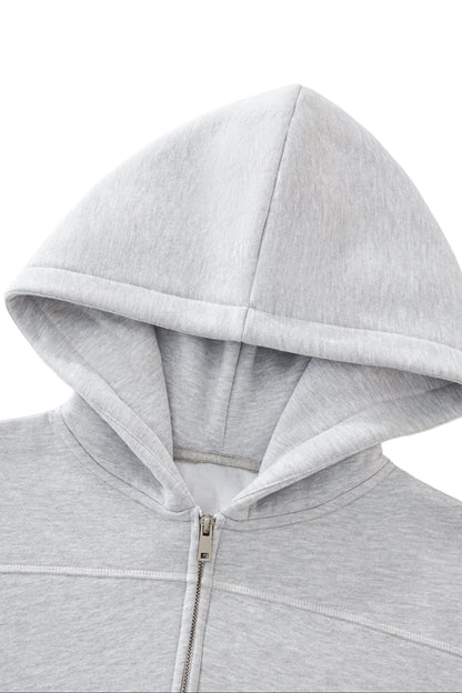 Gray hoodie with a zipper on a white background