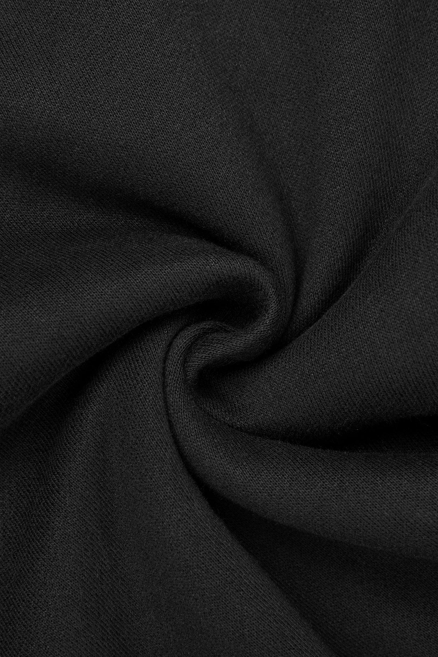 Black fleece zip hoodie fabric with subtle woven texture showcasing soft warm material for casual wear