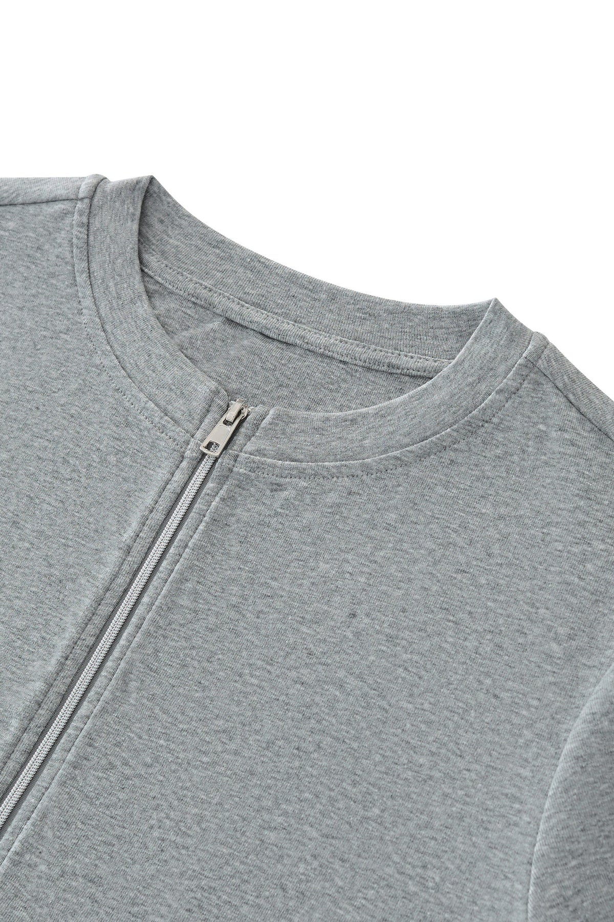 Close-up of a heather gray zip-up sweatshirt showing the ribbed crew neck collar and a silver zipper pull against a plain white background.