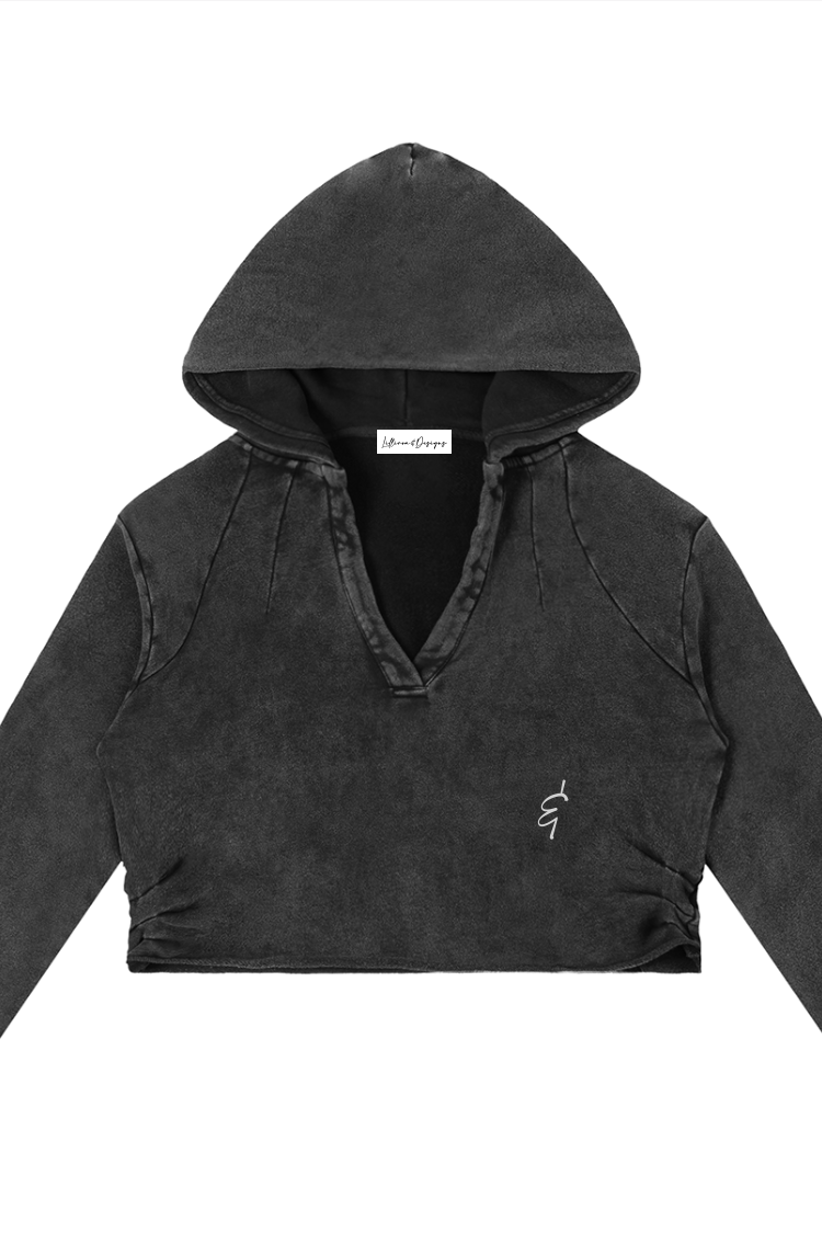 Black cropped raw edge hoodie with subtle distressed texture and small embroidered logo on the chest