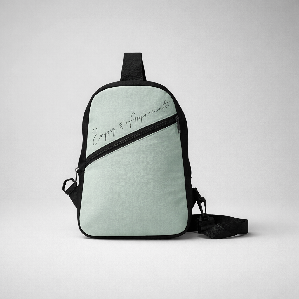 Mint green and black crossbody bag with silver scripted enjoy and appreciate text for stylish daily use