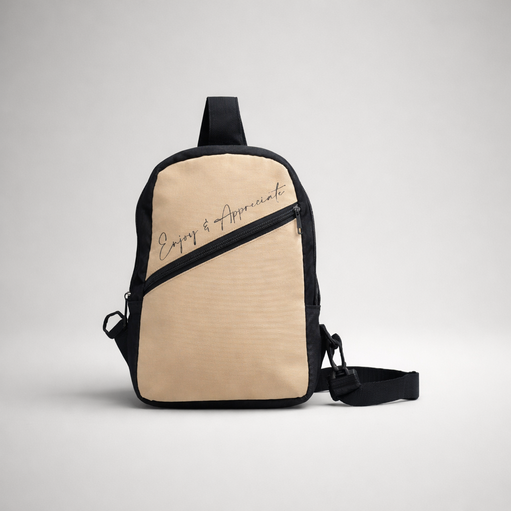 Beige and black crossbody bag with enjoy and appreciate scripted in gold foil ideal for casual use