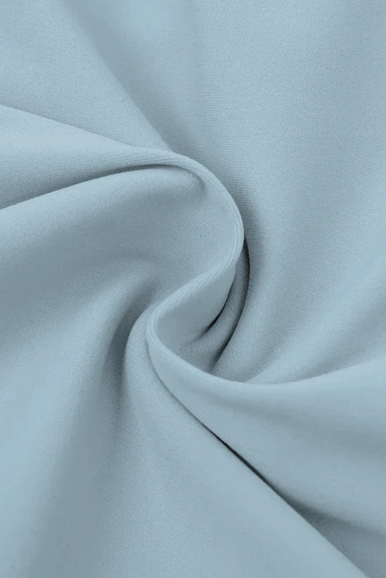 High-waisted seamless flared leggings in soft light blue fabric with smooth texture and gentle folds