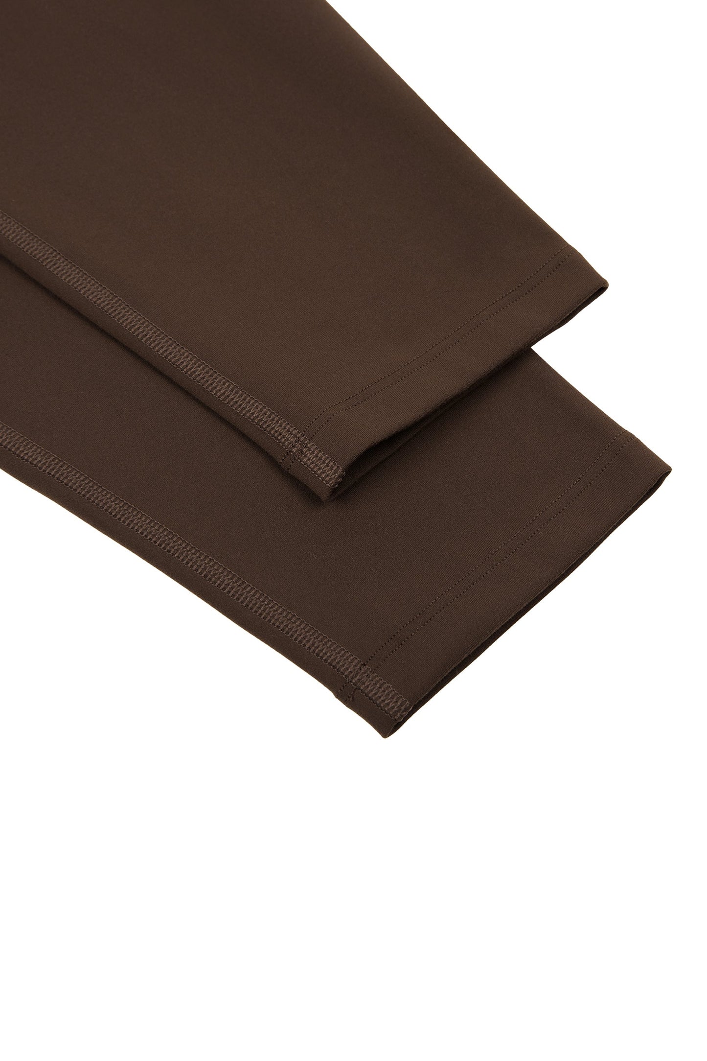 Seamless high waisted activewear leggings in brown fabric with smooth stretchy texture and neatly stitched hems