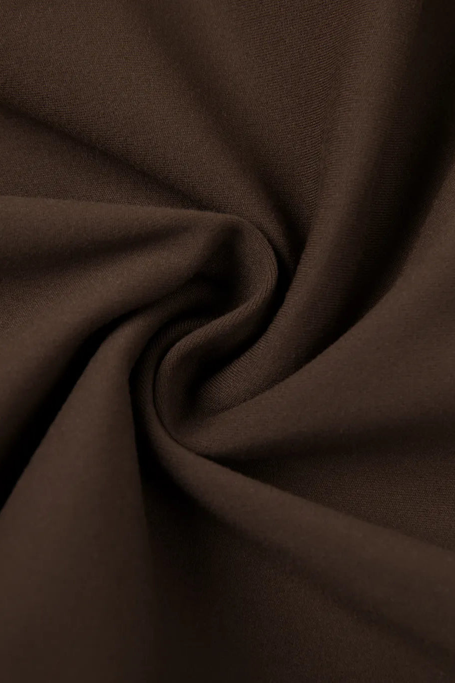 Seamless high-waisted activewear leggings in soft dark brown fabric with smooth texture and subtle sheen