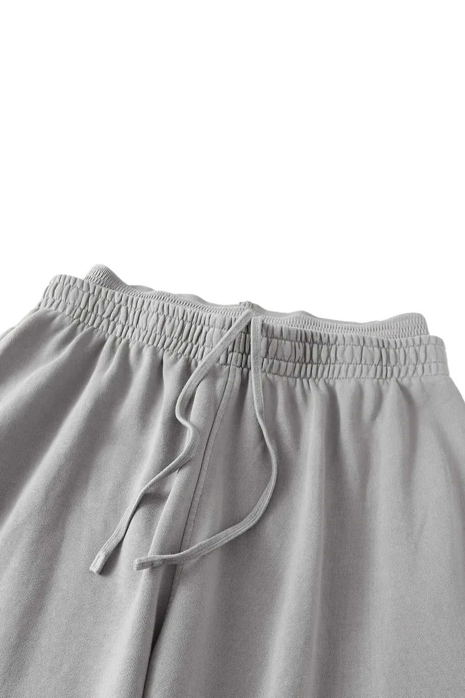 Wide leg sweatpants in gray with elastic waistband and matching drawstring for comfortable casual wear