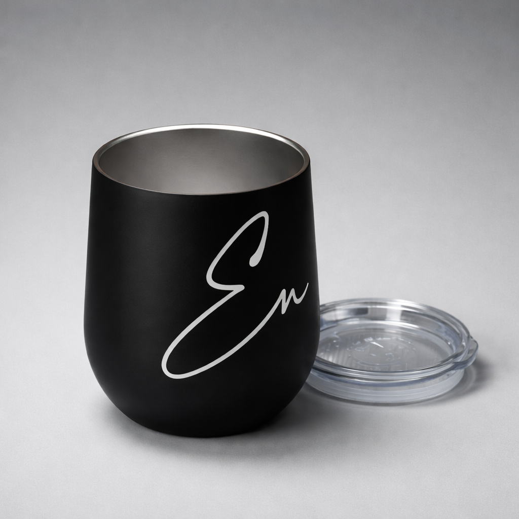 Black matte insulated sports cup with silver interior white cursive engraving and clear plastic lid