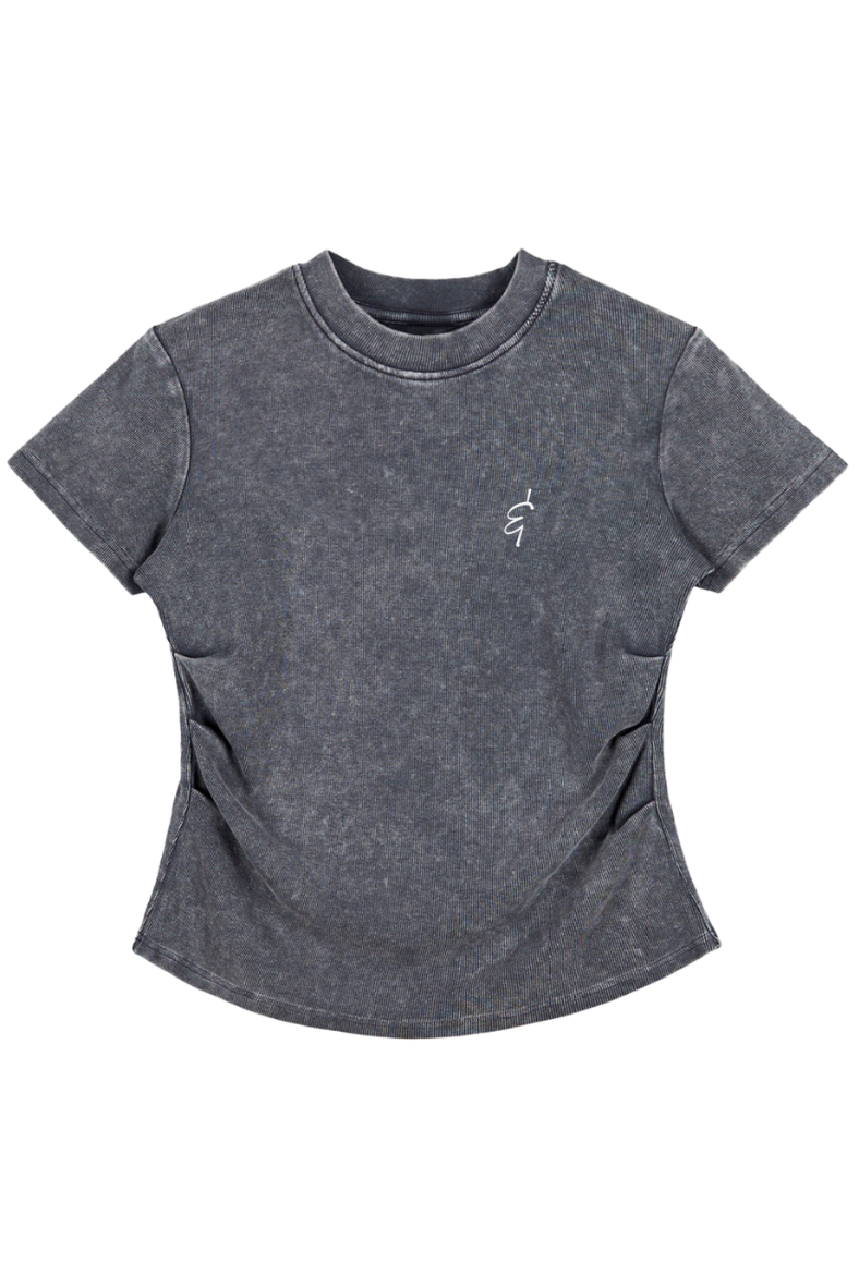 Gray t-shirt layed flat with a small ampersand logo on a white background