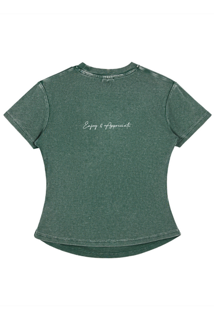 Green t-shirt with text of Enjoy & Appreciate on the back against a white background