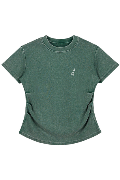 Green t-shirt with a small logo of an ampersand on a white background