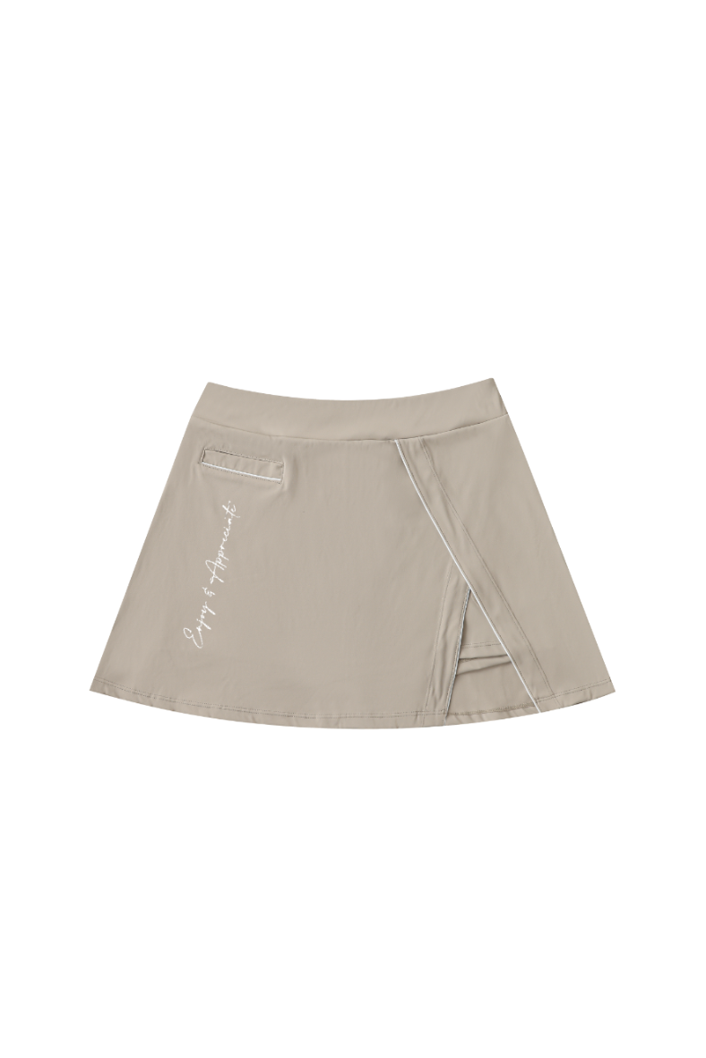 Beige skirt with a brand name of Enjoy & Appreciate on a white background