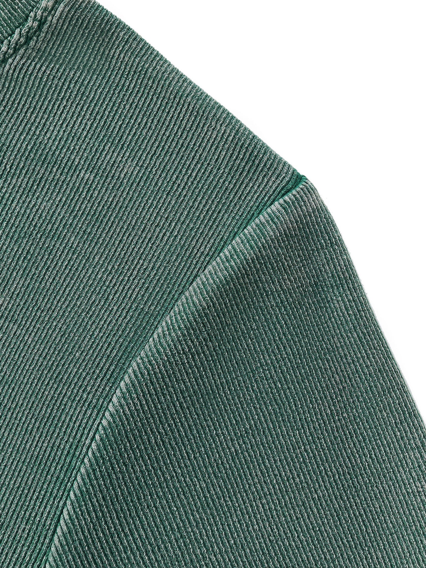 Close-up of green corduroy fabric texture