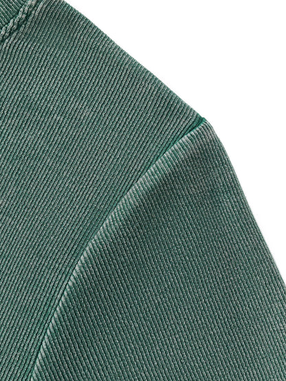 Close-up of green corduroy fabric texture