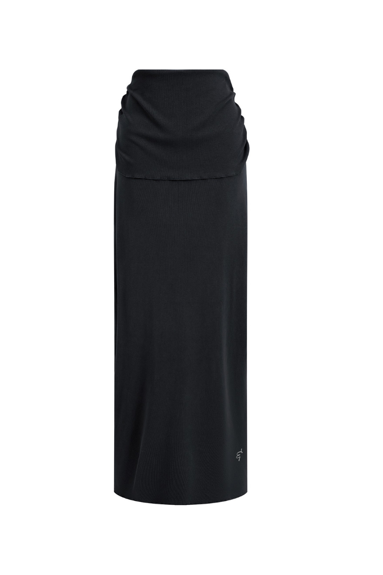 Black long skirt with a draped top on a white background