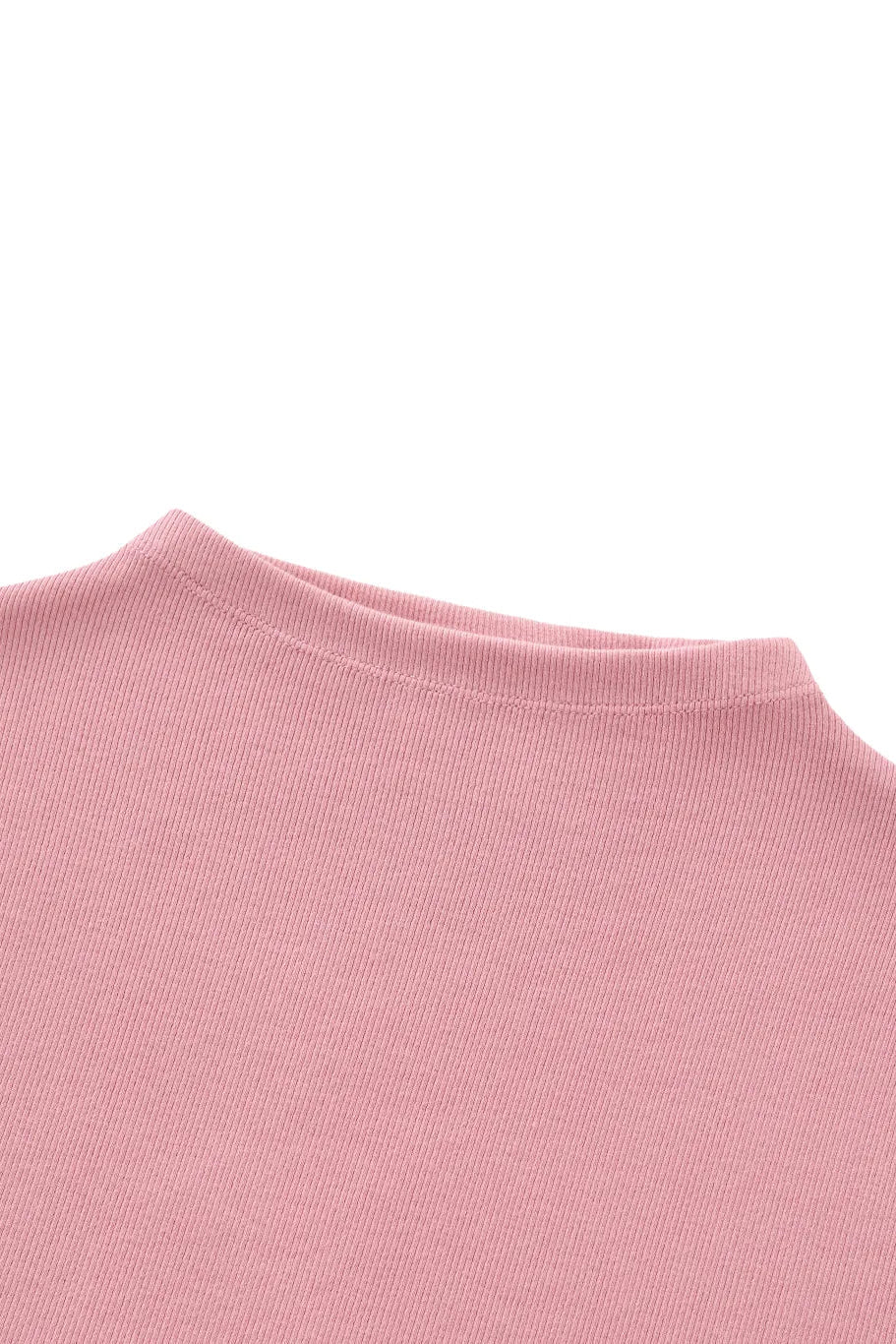 Close-up of the neckline of a top in pink textured fabric on a white background