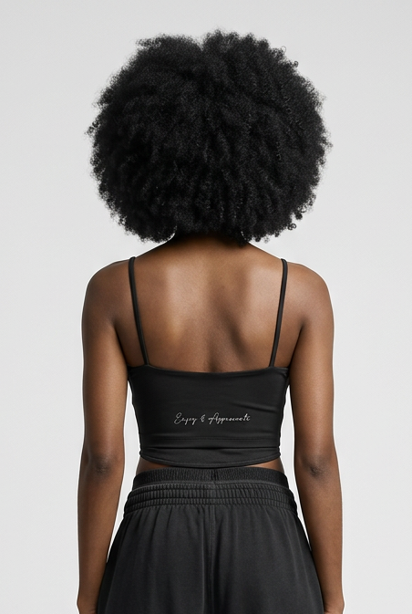 Black sports bra with spaghetti straps showing back with enjoy and appreciate silver embroidery detail