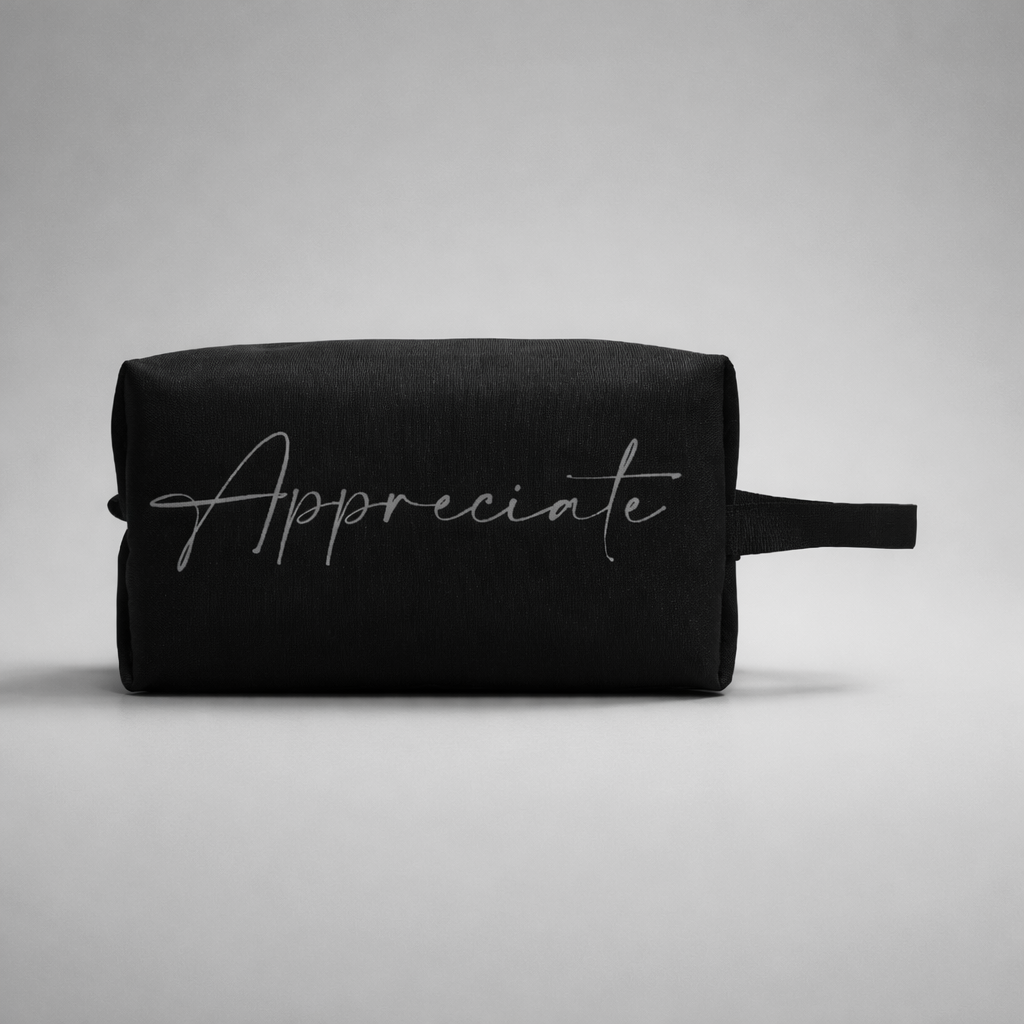 Black fabric sports toilet bag mini with silver cursive appreciate embroidery across the front