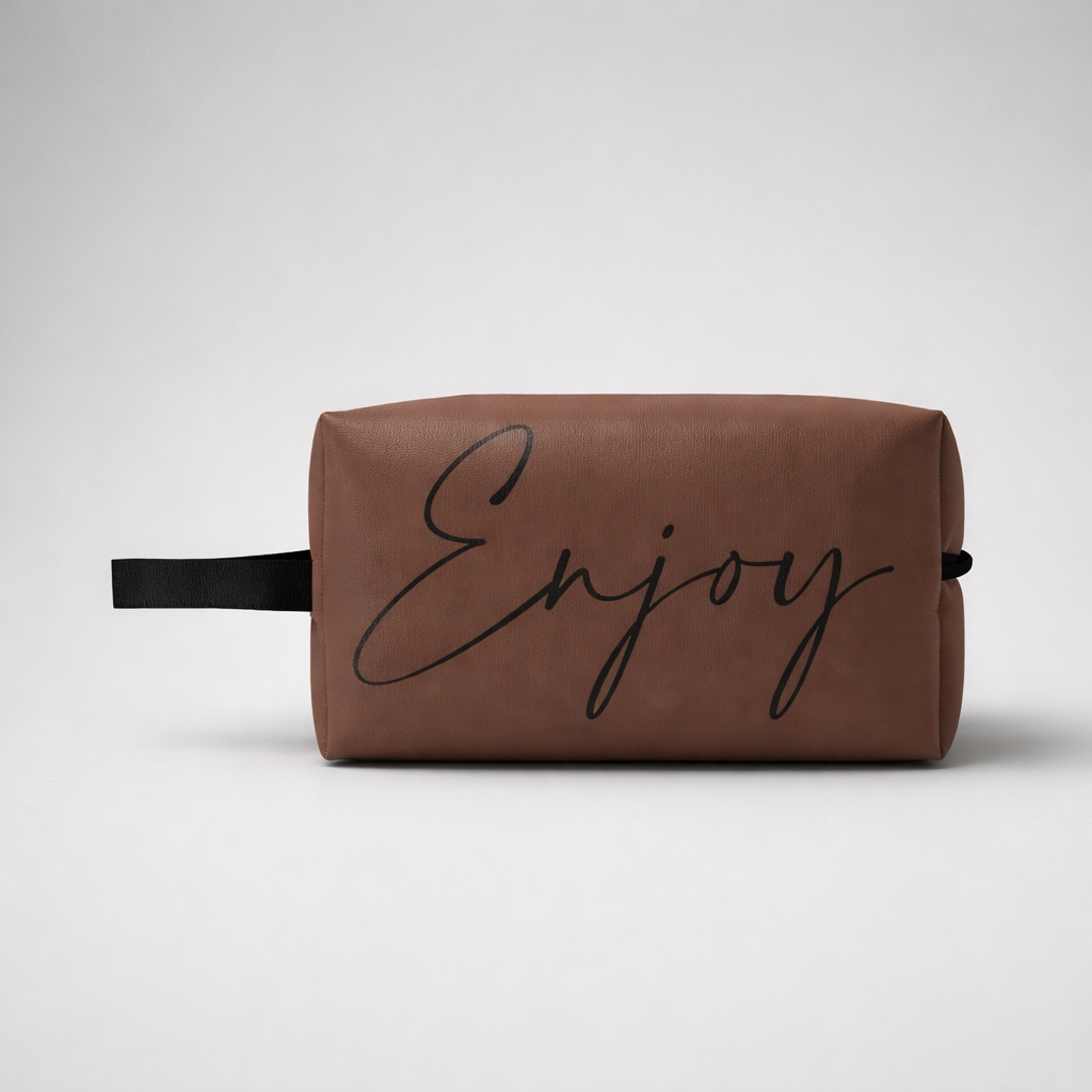 Brown leather-like sports toilet bag mini with black cursive enjoy print and matching black handle