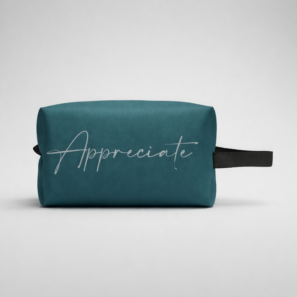 Sports toilet bag mini in teal fabric with white appreciate cursive inscription and black strap for travel use