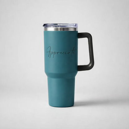 Teal insulated sports travel mug with black handle and clear lid featuring appreciate in cursive script for on the go use