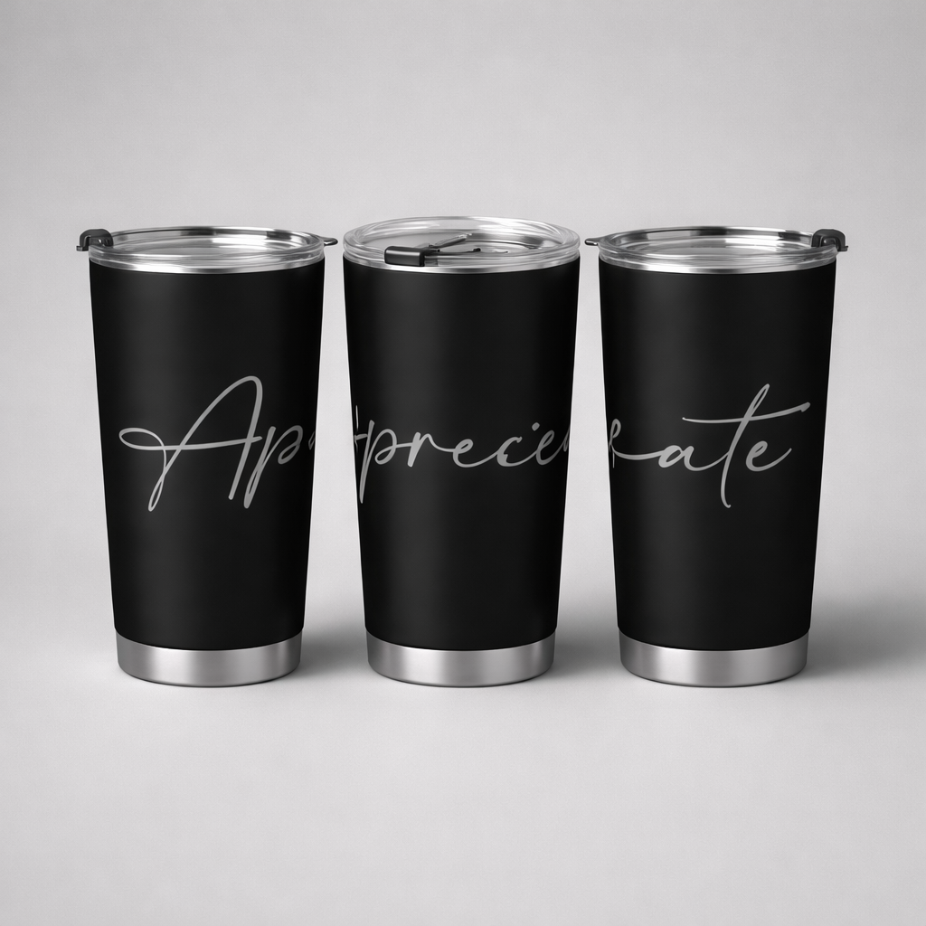Black tall insulated tumbler with silver metallic accents and a cursive appreciate inscription
