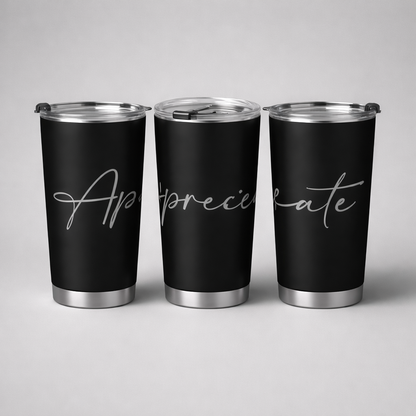 Black tall insulated tumbler with silver metallic accents and a cursive appreciate inscription