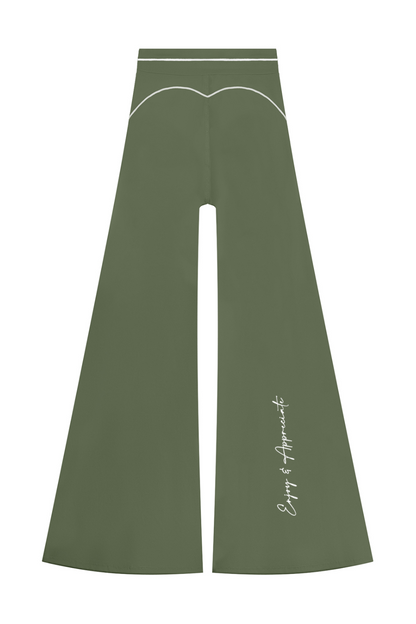 Olive green wide-leg flare pants with white contrast stitching, a decorative curved line near the waistband, and white script text on the lower left leg, shown against a plain white background.