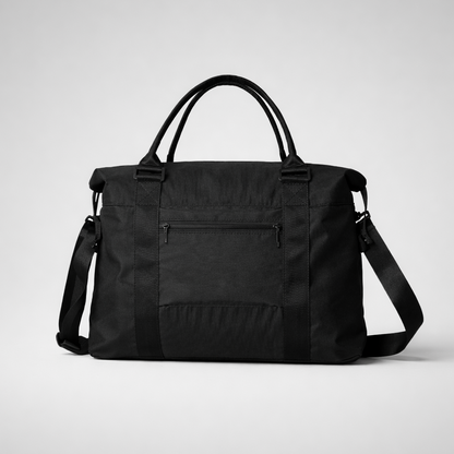 Black nylon travel bag with intention featuring rolled top handles and adjustable shoulder strap for easy carrying