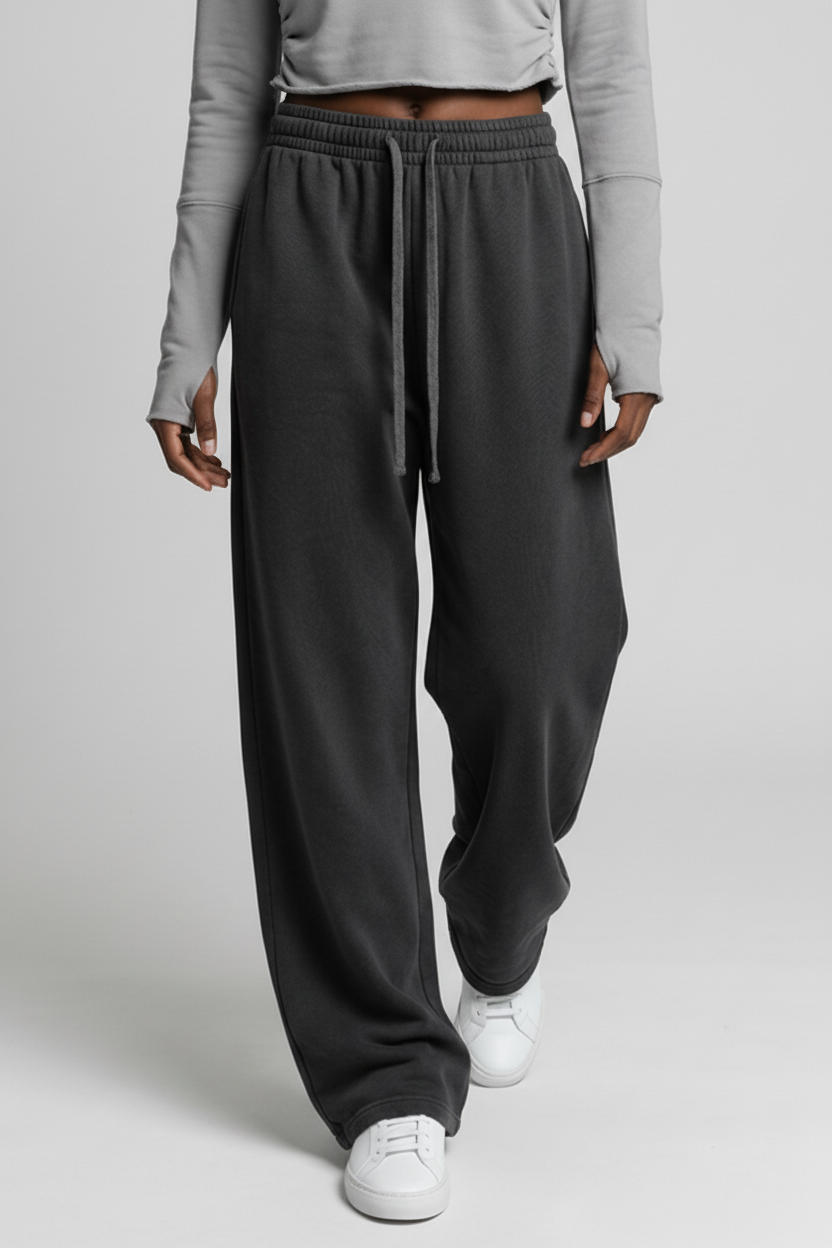 Wide leg sweatpants in dark gray with a loose fit elastic waistband and matching drawstring for comfort