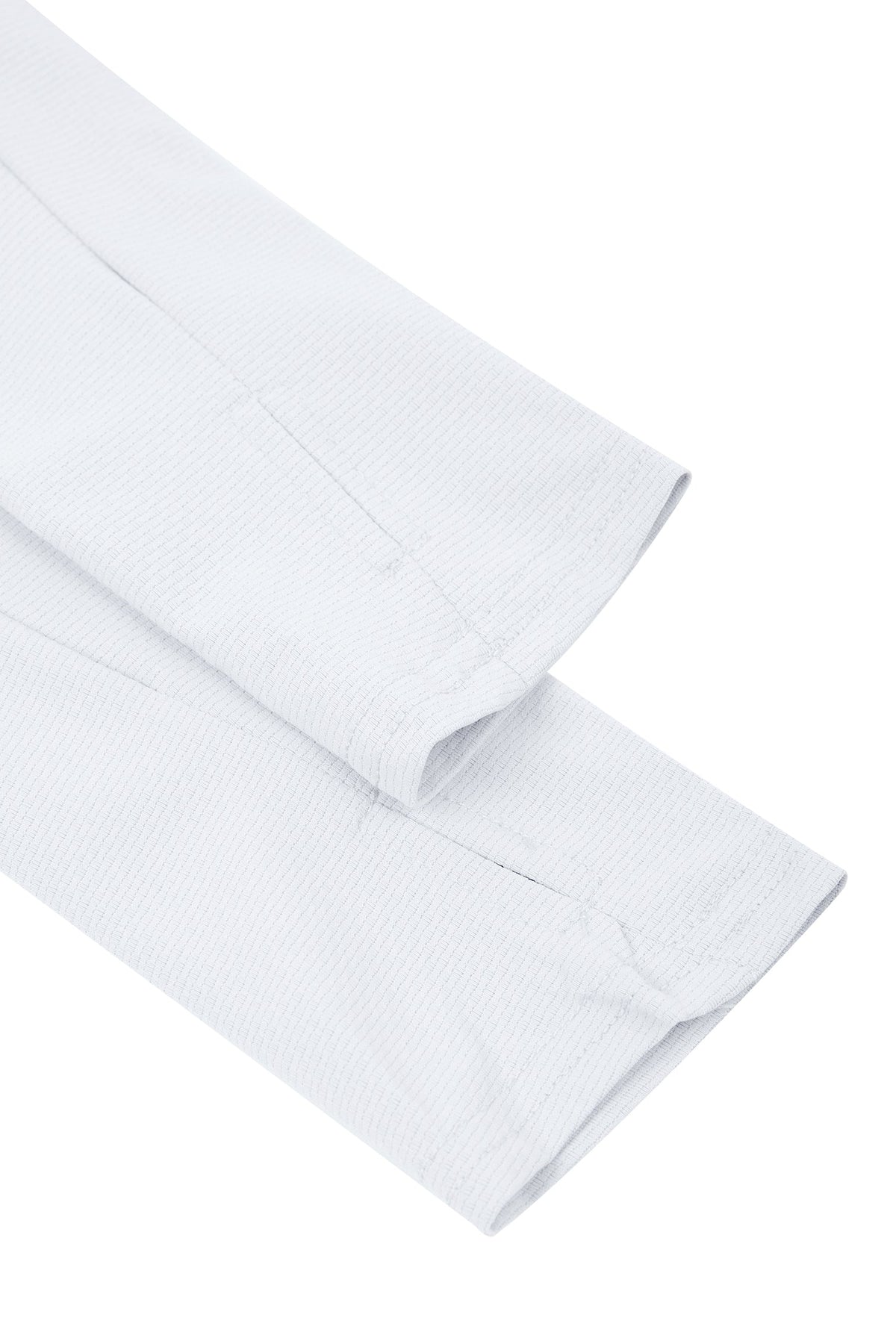Close-up of a white shirt with a collar on a white background