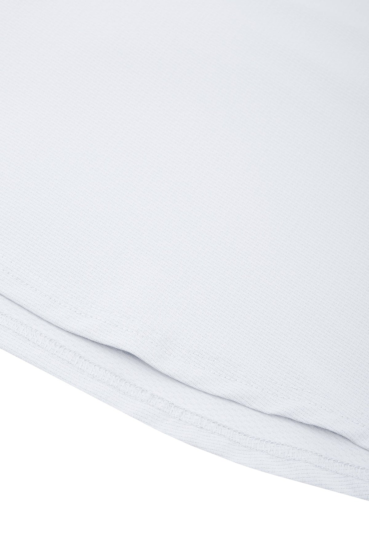 Close-up of a white fabric texture on a white background