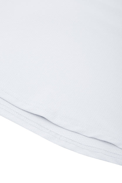 Close-up of a white fabric texture on a white background