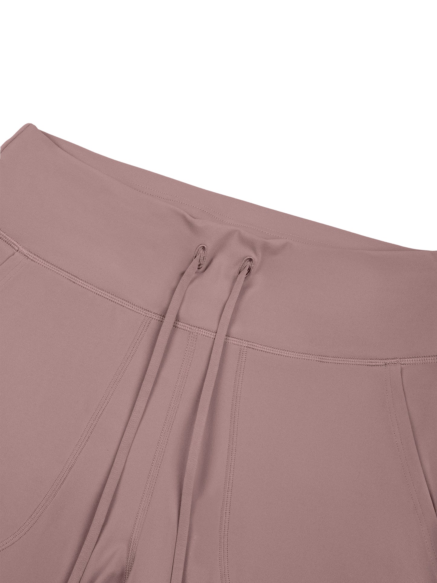 Close-up of a brown garment with a zipper detail on a white background