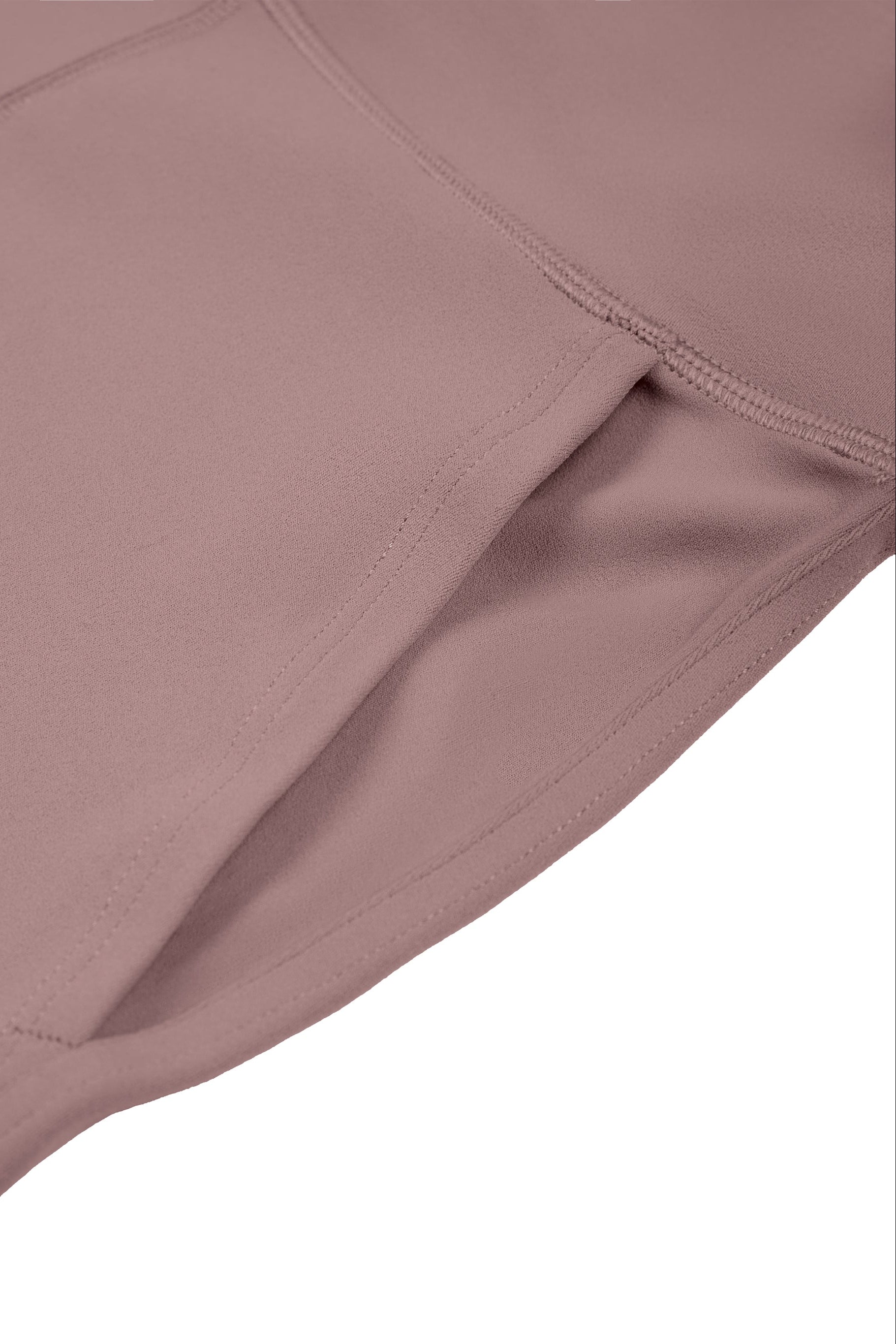 Close-up of a mauve fabric with a white background