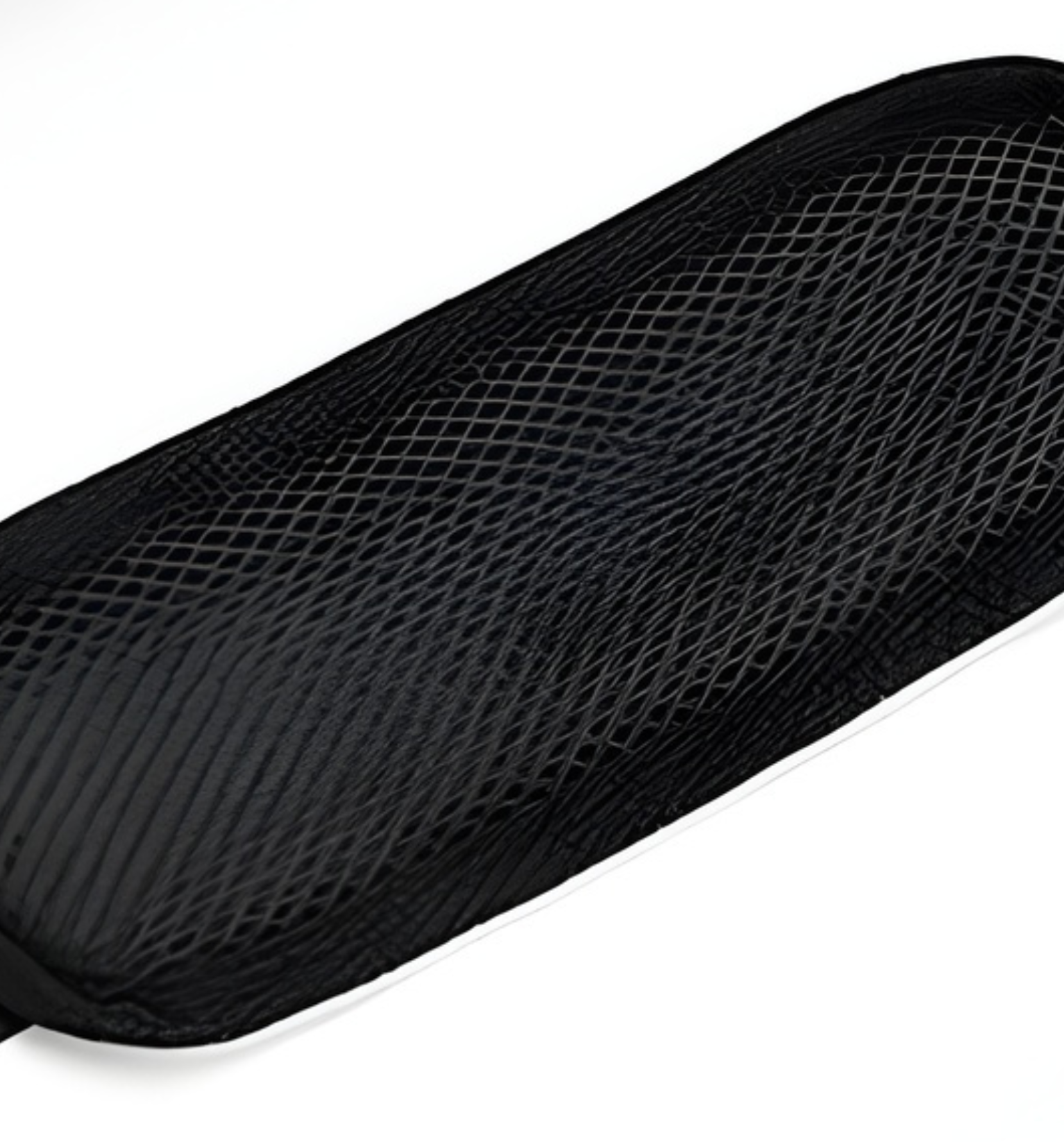 Black mesh shoe insole with textured grid pattern and reinforced edges for gym duffel bag use