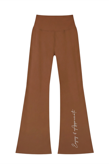 Brown high waisted seamless flared leggings with subtle gold enjoy and appreciate script along the outer leg