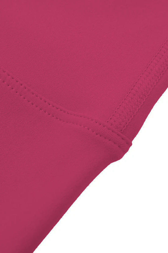 High-waisted seamless flared leggings in fuchsia stretch fabric with fine stitching along the seam