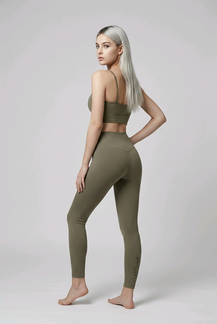 Olive green high-waisted seamless activewear leggings with a sleek form-fitting design and subtle side seam detailing