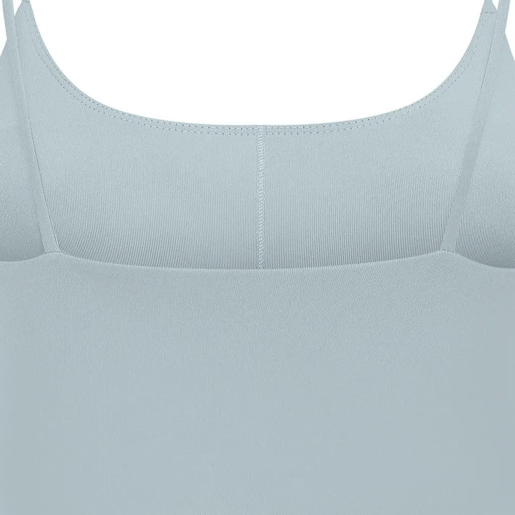 Light blue ribbed fabric top with thin straps and a square neckline